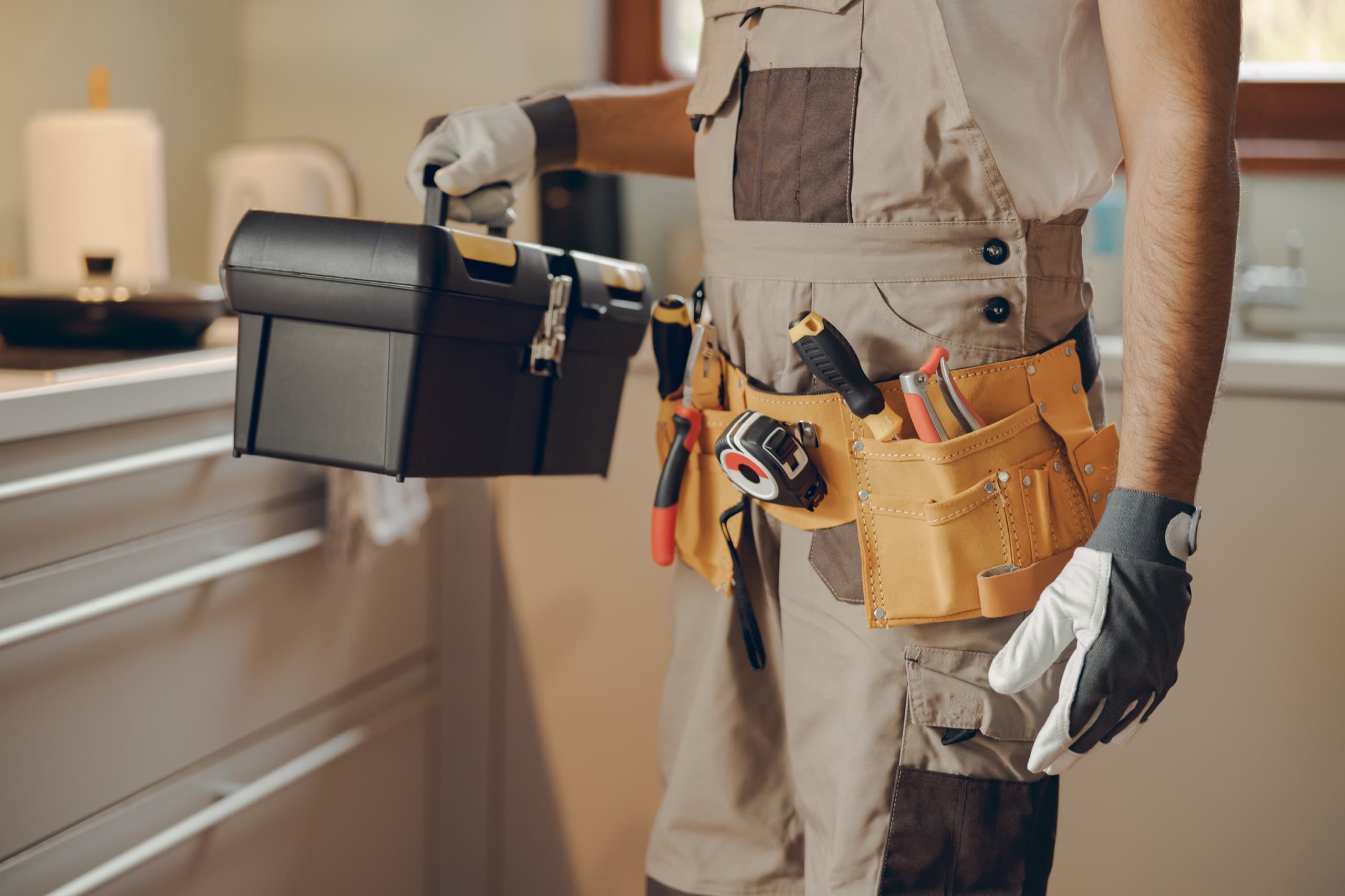 Professional repairman ready to perform home maintenance