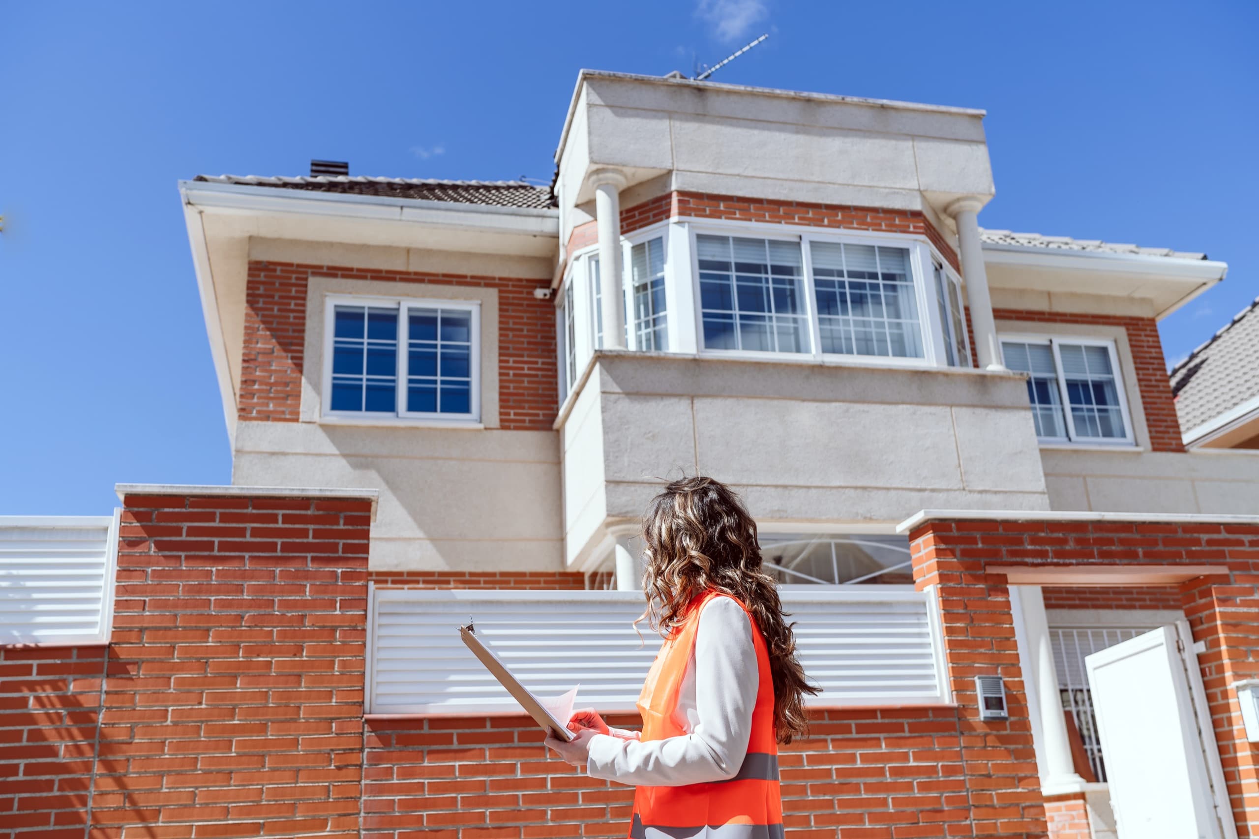 Professional inspector conducting a property walkthrough
